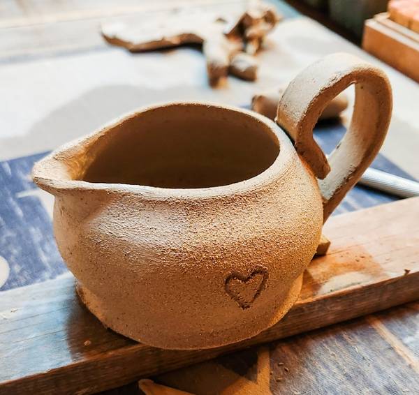 Earthenware pottery pitcher