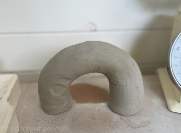 horseshoeing pottery clay