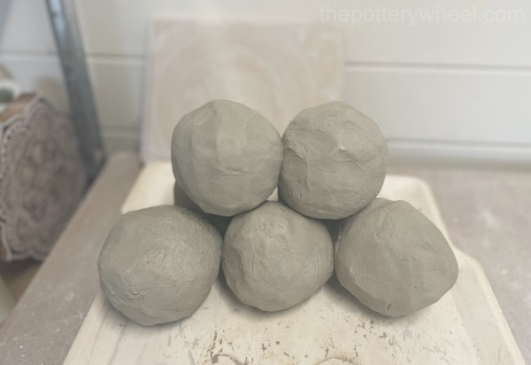 balls of clay prepared for pottery