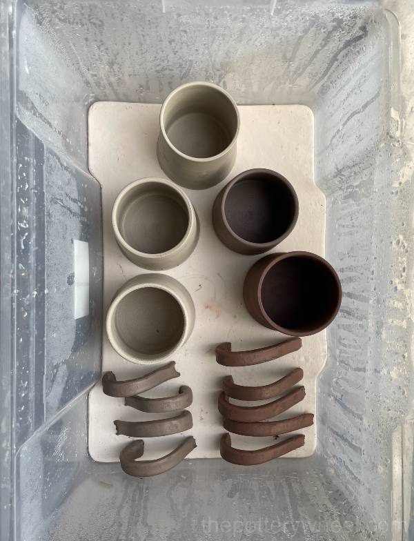 pottery in a damp box