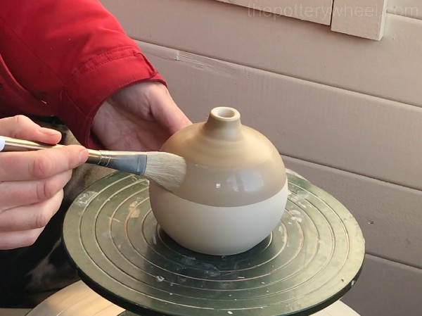 applying terra sigillata to pottery