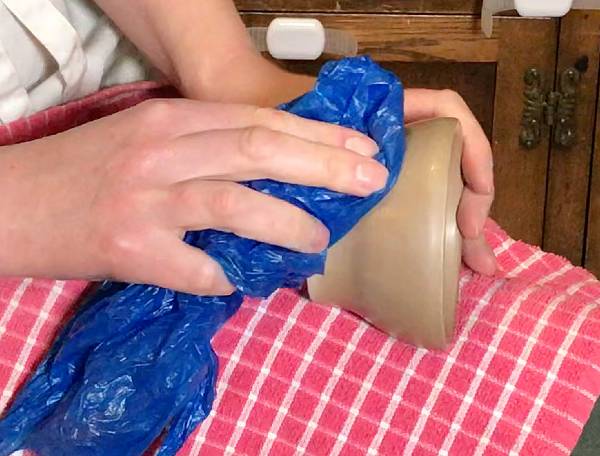 burnishing pottery with a plastic bag
