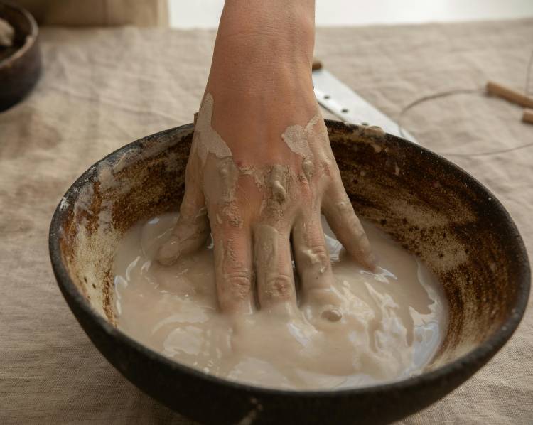 Dry hands from pottery clay