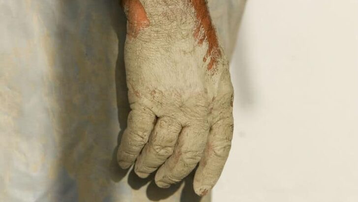 dry hands from pottery clay