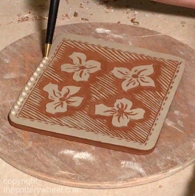 slip trailing with sgraffito slip pottery