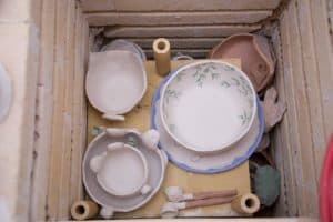 can you fire bisque and glazed pots together