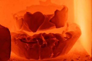 temperature to bisque fire pottery