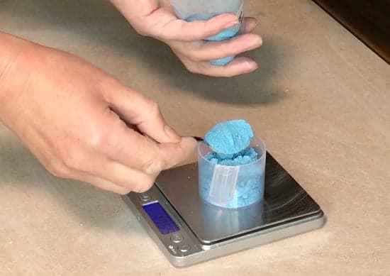 weighing out stains to make colored clay