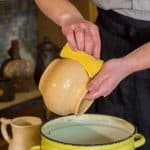 can you wash glaze off bisque pottery