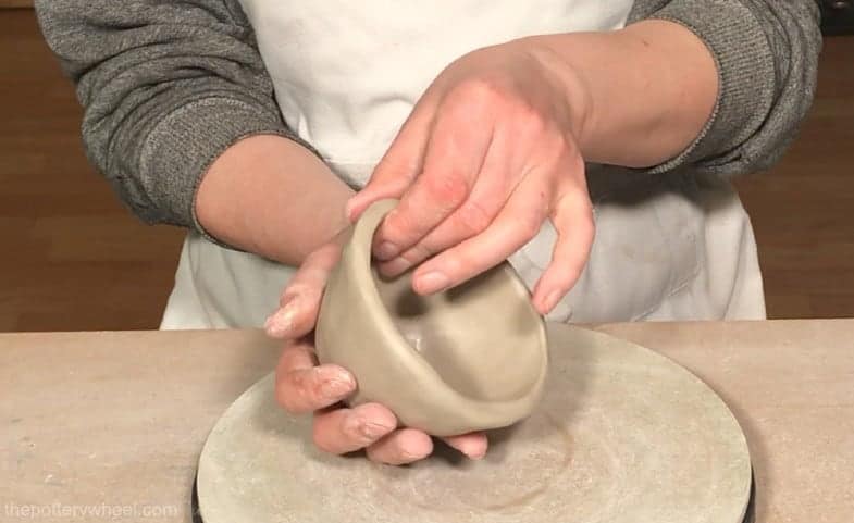 how thick should a pinch pot be