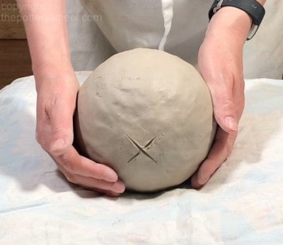 mark on the top of the clay sphere