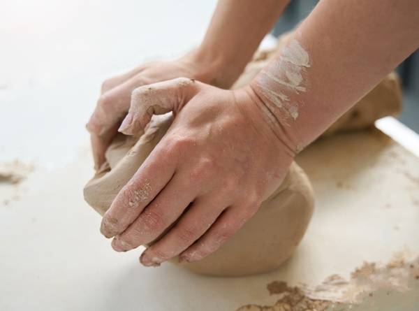 Preparing clay for pottery
