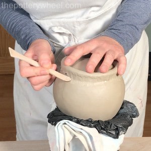 blending foot ring onto double pinch pot