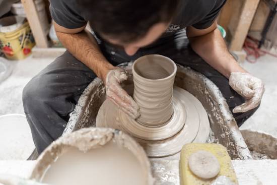 throwing pottery