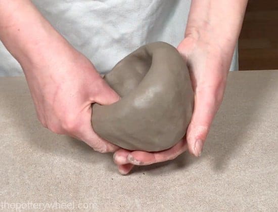 pinching the clay 