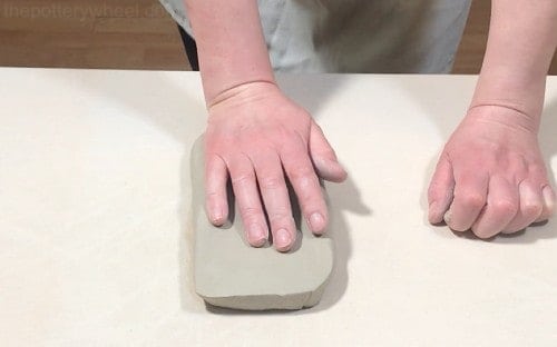 flattening the clay 