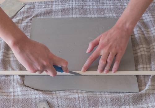 cutting a clay slab