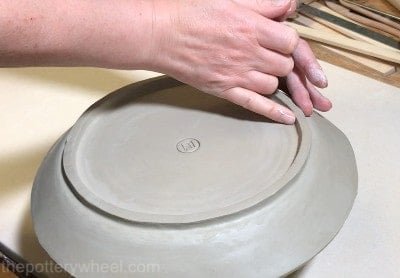 Smoothing the foot ring on the slab plate