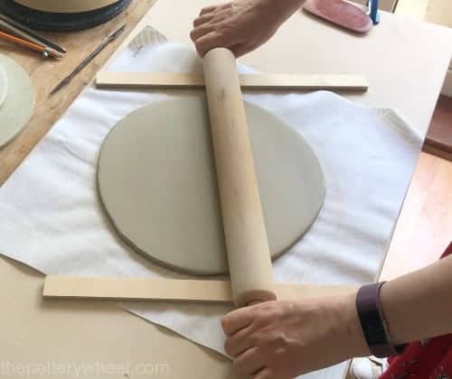 rolling out a clay slab