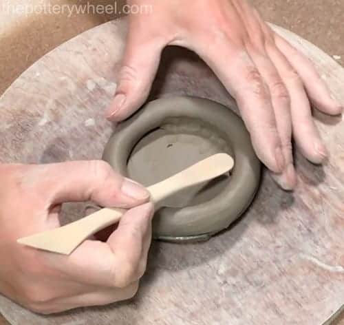 blending the coils on the inside of the coil pot