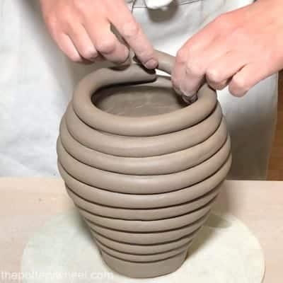 building walls of coil pot in