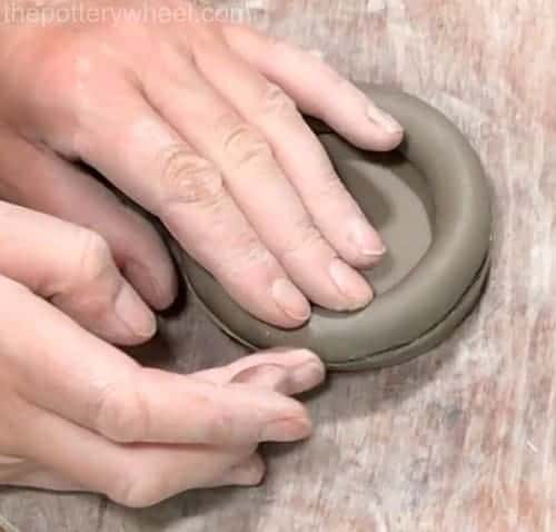 hand building pottery with clay coils