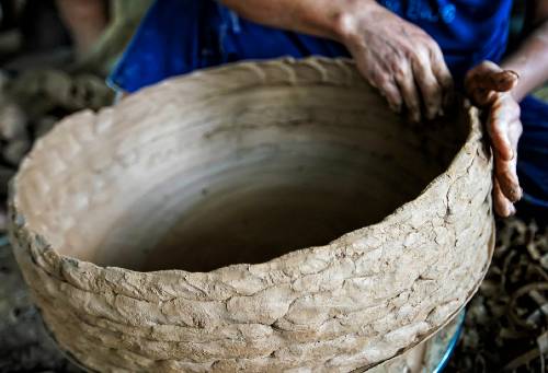 coil pottery being made in rural setting