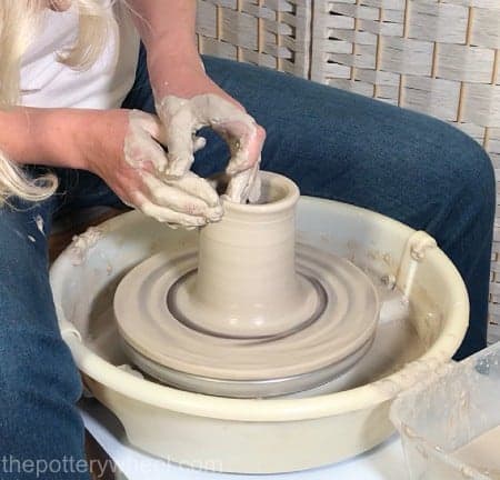 Using a wooden bat on a cheap pottery wheel
