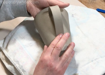 attaching handle onto mug