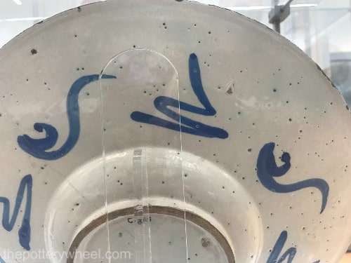 Pin holes on tin glazed pottery