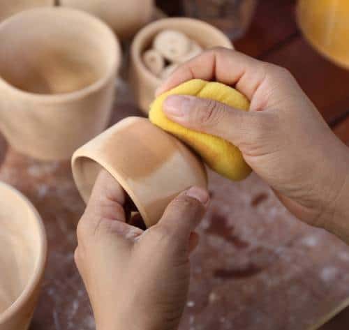 washing bisque pottery