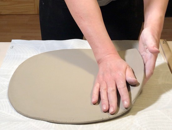 turning clay slab over