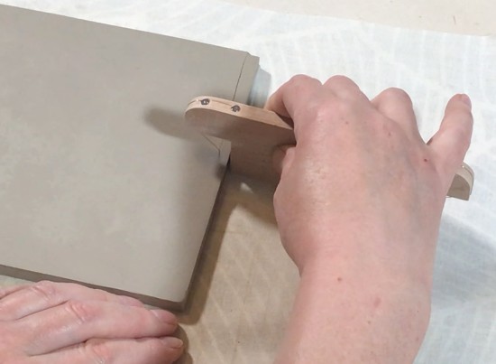 Using a clay beveling tool