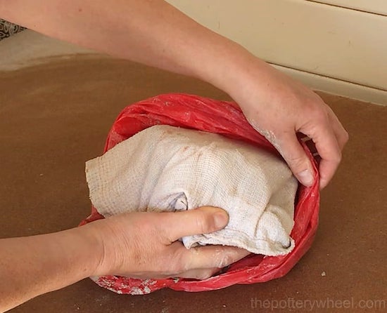 Wrap the clay in a damp towel to store it