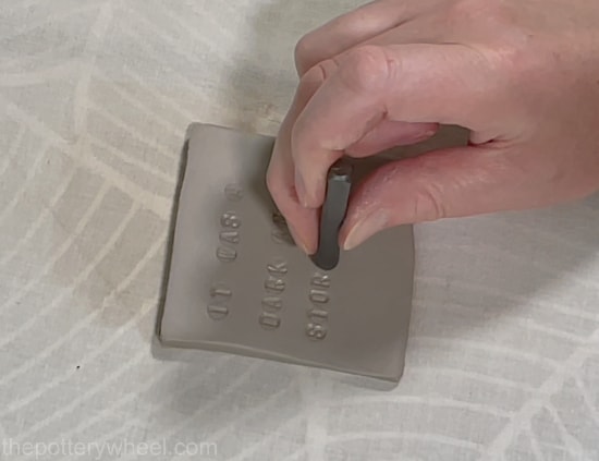 Letter stamps in clay