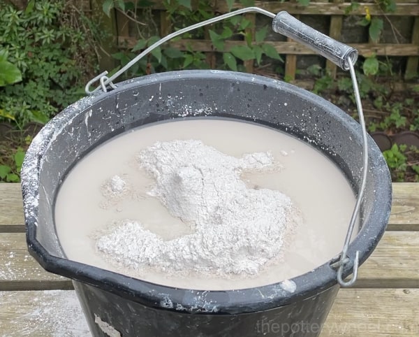 Plaster islands forming in the water