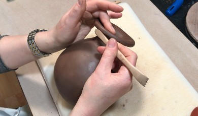 Pottery making with earthenware clay