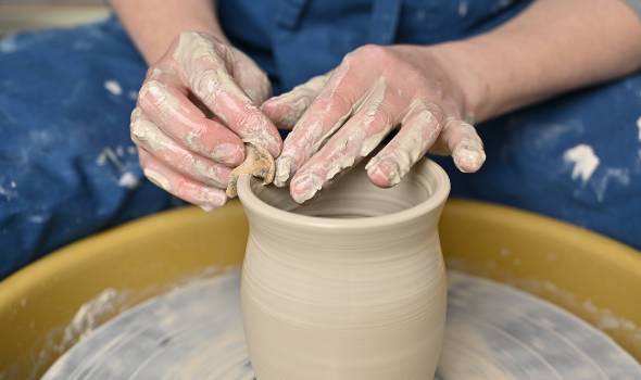 pottery making by wheel throwing