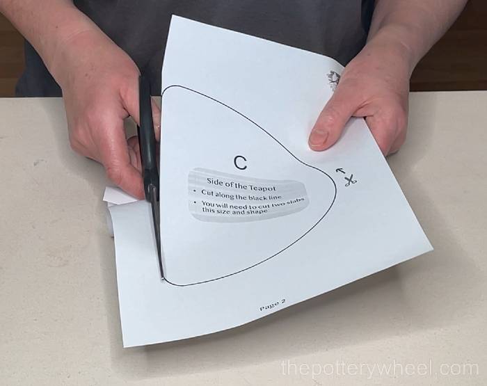 Cutting out the slab pottery teapot template