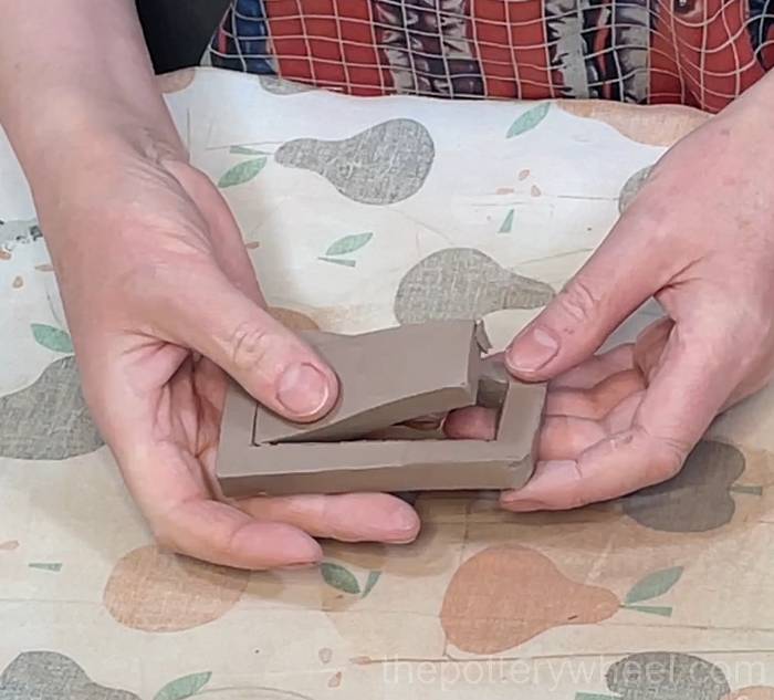 Preparing the rim of the slab pottery teapot