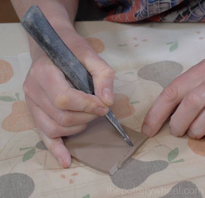 beveling the edges of the slab pottery teapot spout