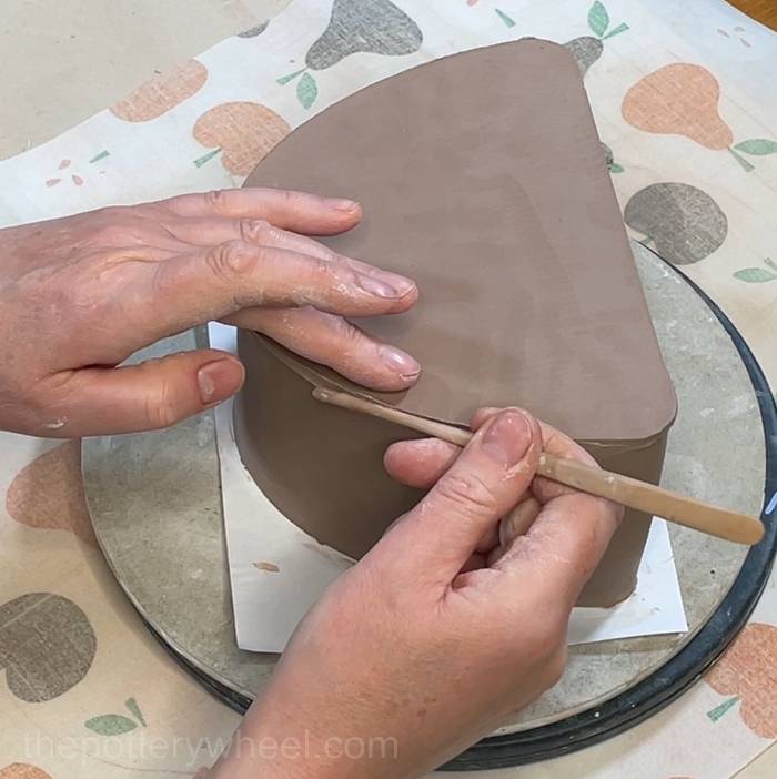 blending in the sides of the slab pottery teapot