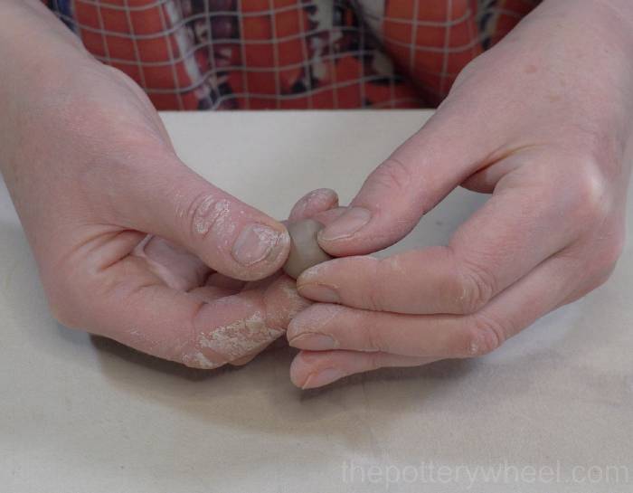 making the slab pottery teapot knob