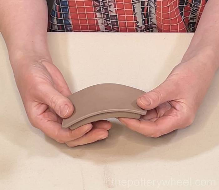 shaping the lid of the slab pottery teapot