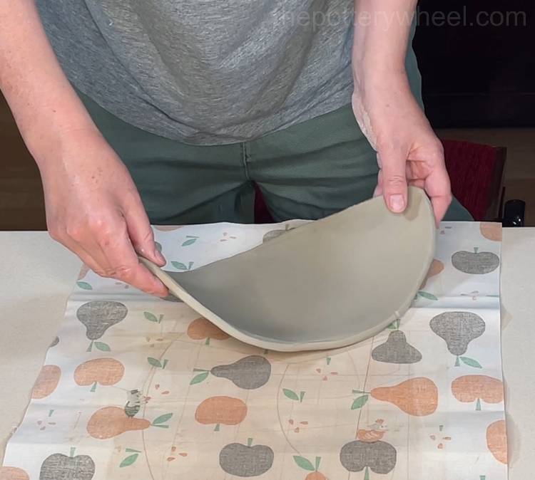 transferring the clay onto a sheet