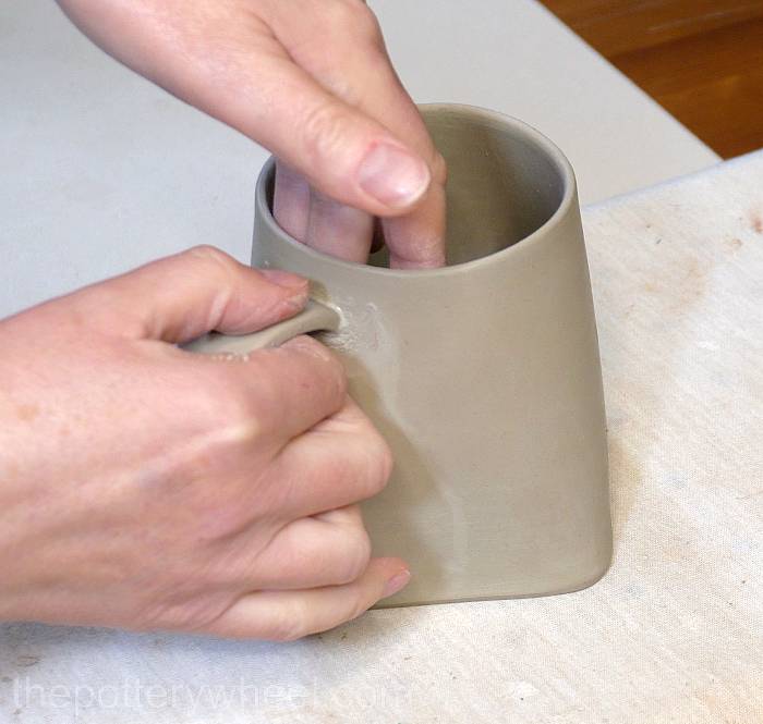 attaching the handle to the slab mug