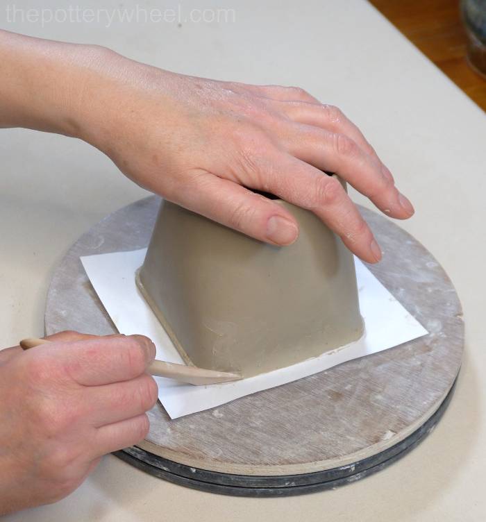 blending the base on the bottom of the square slab mug