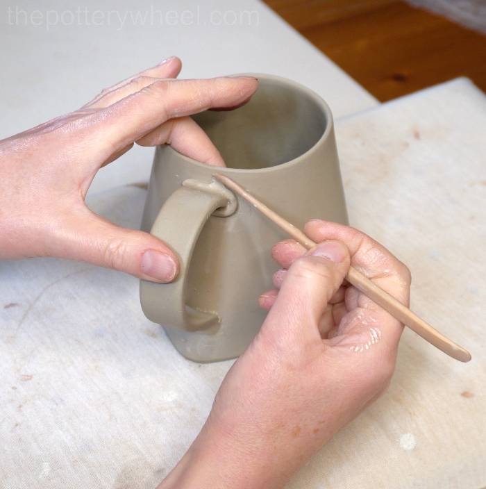 blending the handle on the square bottom slab mug