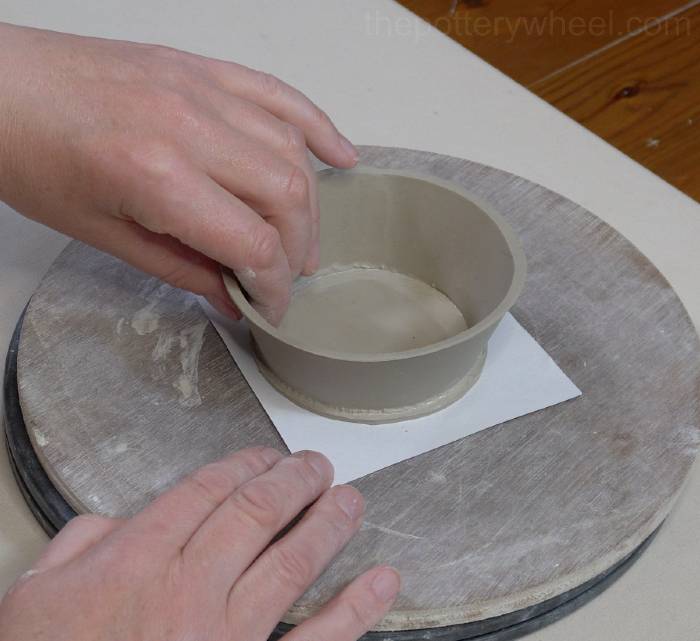 positioning the mug on the bottom slab