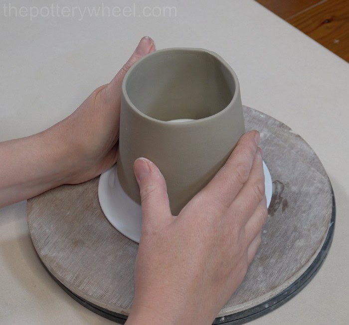 shaping the bottom of the mug